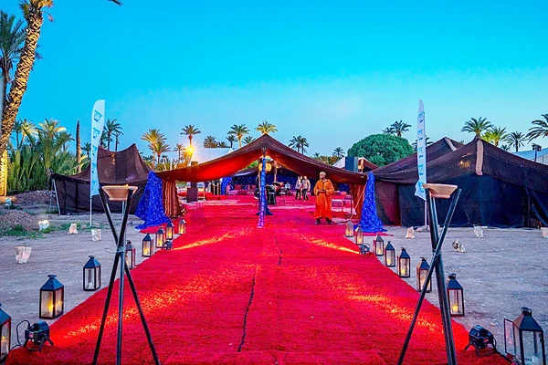 Red carpet and lantern-lit Berber tents for a corporate evening